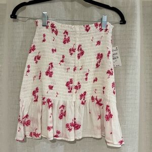 White and pink floral mini skirt